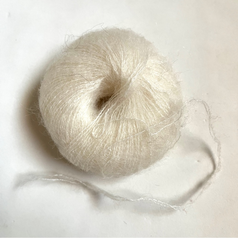 Luxurious Soft White Mohair Yarn Skein for Fiber Arts.